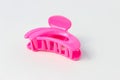 Pink-colored Jaws Hair Clip  on a White Background Royalty Free Stock Photo