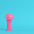 Pink column with soccer ball on bright blue background in pastel Royalty Free Stock Photo