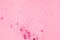 Pink confetti background. Top view, flat lay. Royalty Free Stock Photo