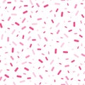 Pink confetti sprinkles seamless pattern.