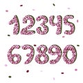 Pink confetty doodle numbers. vector font