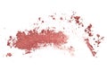 Pink coral eyeshadow and blush smeared isolated on white background. Royalty Free Stock Photo