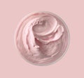 Pink cosmetic cream