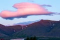 Cotton candy cloud over mountains Royalty Free Stock Photo