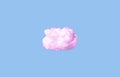 Pink cotton cloud on blue sky background. Weather, meteorology or dreaming and fantasy concept in surreal fairy style.