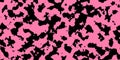 Pink cowhide with black spots as a seamless pattern Royalty Free Stock Photo