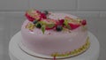 Pink creamy cake with fruits. Sweet dessert for birthday holiday, advertisement of new bakery cafe. Concept of