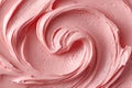 Pink creamy frosting swirl texture close-up for sweet background Royalty Free Stock Photo