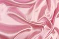 Pink crepe satin crumpled or wavy fabric texture background. Abstract linen cloth soft waves. Silk fabric. Smooth Royalty Free Stock Photo