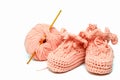 Pink crocheted babby's bootees