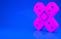 Pink Crossed bandage plaster icon isolated on blue background. Medical plaster, adhesive bandage, flexible fabric