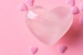 Pink crystal quartz heart sugar candy sprinkles on monochrome background. Romantic Valentines Mother`s Day