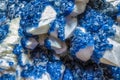 Pink crystals and other blue crystals Royalty Free Stock Photo