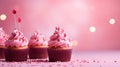 Pink cupcakes on a pink background