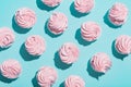 Pink cupcakes on blue background