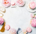 Pink cupcakes with roses and holiday decor in frame. Festive and bright. Wedding Celebration concept. Copy space. Royalty Free Stock Photo