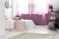 Pink curtains over bright window Royalty Free Stock Photo