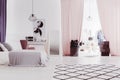 Pink curtains in sophisticated bedroom Royalty Free Stock Photo