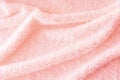 ink delicate soft background of fur plush smooth fabric. Texture of peach soft fleecy blanket textile. Girly wallpaper