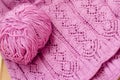 Pink detail of woven handicraft knitting sweater o