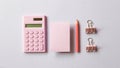 Pink digital calculator, memo pad, pencil, clip on purple background Royalty Free Stock Photo