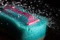 Pink disposable razor with bath sponge Royalty Free Stock Photo