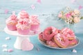 Pink donuts and cup cakes