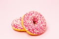 Pink donuts on pink background