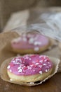 Pink donuts with sugar icing Royalty Free Stock Photo
