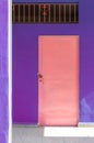 Pink Door and Purple Wall in Cuba Royalty Free Stock Photo