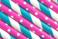 Pink dot and blue paper straw closeup Royalty Free Stock Photo