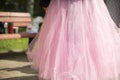 Pink dress. Skirt on girl. Pink fabric