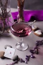 Pink drink in a glass in a romantic elegant setting - a women`s party or a romantic date