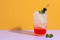 Pink Drink with Ice Cube, Mint Leaf, and Blueberry. Berry Lemonade Royalty Free Stock Photo