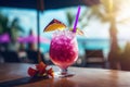 Pink Drink with Purple Umbrella and Flower on Table Royalty Free Stock Photo