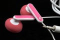 Pink Earbuds Closeup, macro, on black