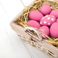 Pink Easter eggs on wodden background. Still life photo of lots of pink easter eggs. Copyspace. Royalty Free Stock Photo