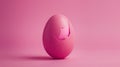 Pink egg with a cracked shell on a pink background Royalty Free Stock Photo