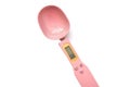 Pink Electronic Measuring Spoon. Wide LCD screen. White background Royalty Free Stock Photo