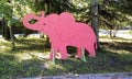 Pink elephant in city garden