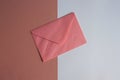 Pink envelope on colorful background