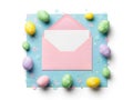 Pink envelope with easter eggs isolated on white background Royalty Free Stock Photo