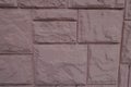 Pink facing tile with stone-like texture Royalty Free Stock Photo