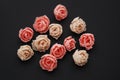 Pink Fake Rosess Black Background. Lot of Artificial Pink Peach Flowers Copy space