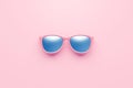 Pink fashion sunglasses and blue lens optic on summer object background with modern accessory design. 3D rendering