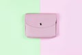 Pink fashion woman purse. Female handbag on colorful background.