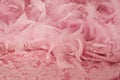 Pink feathers on crushed velvet Royalty Free Stock Photo