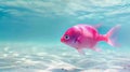 Pink fish swimming near sandy ocean floor Royalty Free Stock Photo