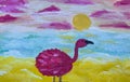 Pink flamingo at sunset on the shore