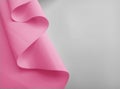 Pink flexible fabric roll with copy space